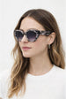 Round Stripe Cat Eye Sunglasses In Black by SVNX