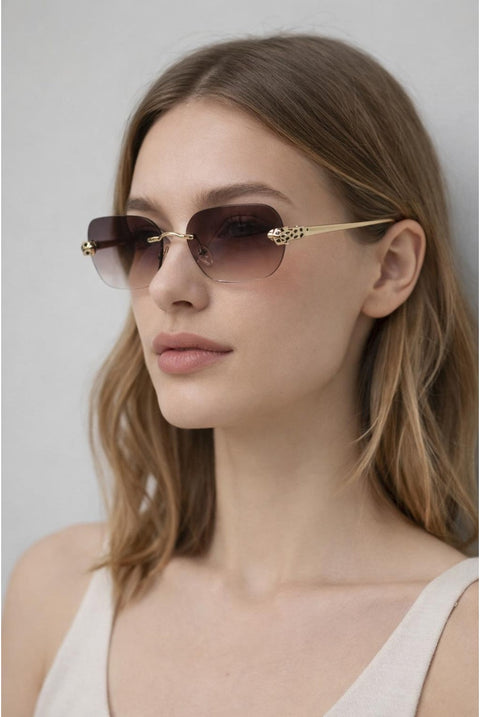 Jaguar Detail Rimless Sunglasses In Brown by SVNX