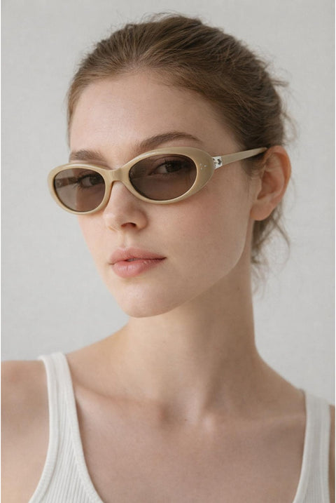 Oval Sunglasses In Beige - Foldable by SVNX