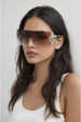 Flatop Rimless Heart Detail Sunglasses In Brown by SVNX
