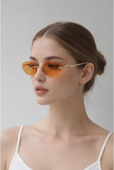 Orange - Rimless Oval Geo Metal Sunglasses In Orange by SVNX