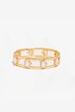 Gingko Gold Shell Bangle by Uchi & Soto