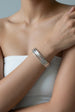 Nami Silver Twist Bangle by Uchi & Soto