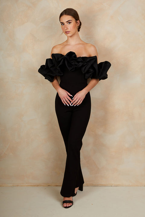 Ruffle Bardot Jumpsuit In Black by Chi Chi