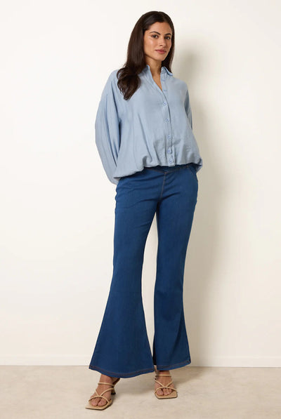Denim Blue - Flared Cross Over Waistband Jeans by Blue Vanilla