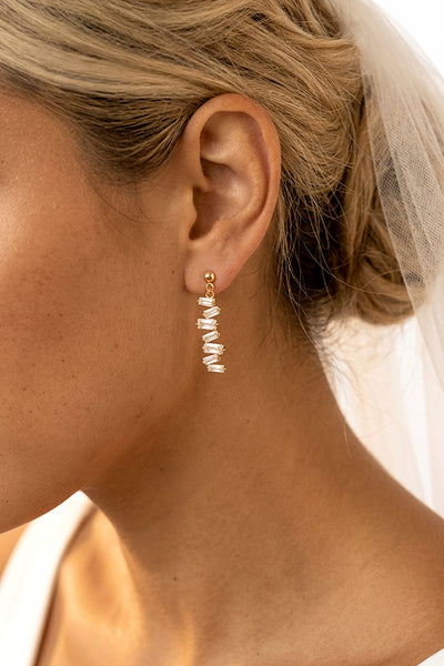 Gold - Gold Drop Earrings With Baguette Stones by MUCHV